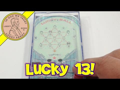 Tomy Pocket Lucky Ball Handheld Game, 13 Is A Lucky Number!